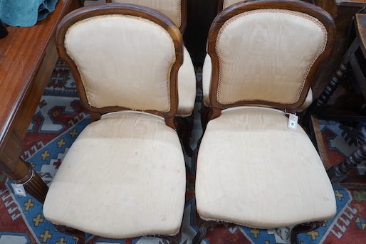 A set of four 19th century French Hepplewhite style rosewood dining chairs